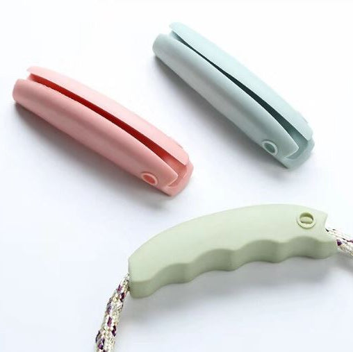 Bärhandtag för väskor och kassar